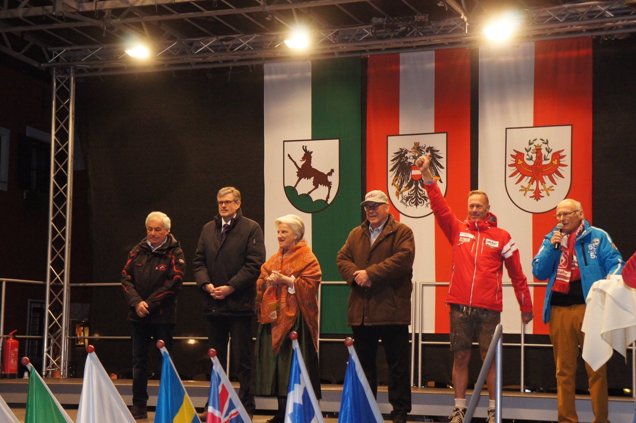 IASF Official in Arctica Team apparel and Mayor of Kitzbuhel and other officials at opening ceremonies for World Airline Ski Championships 2018 