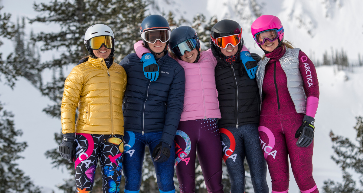 A group of ski racers in their Arctica Featherylte Down jackets and vests