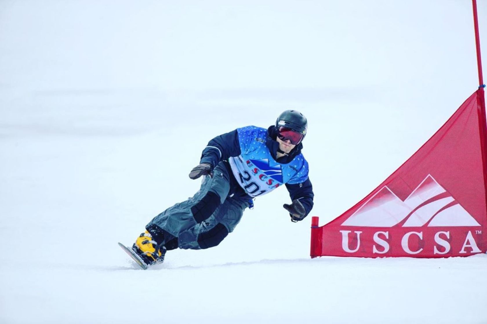 Myles Silverman racing at a USCSA event in his Arctica All Mountain Pants and Viper Jacket