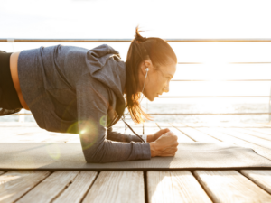 Girl Plank Reach Outdoors