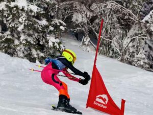 Ali Gregory Ski Racing in Arctica Pinnacle Suit