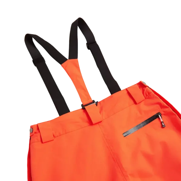 Close-up of the black suspenders and zip back pocket on the Arctica Adult Side Zip Pants 2.0 in Volcano.