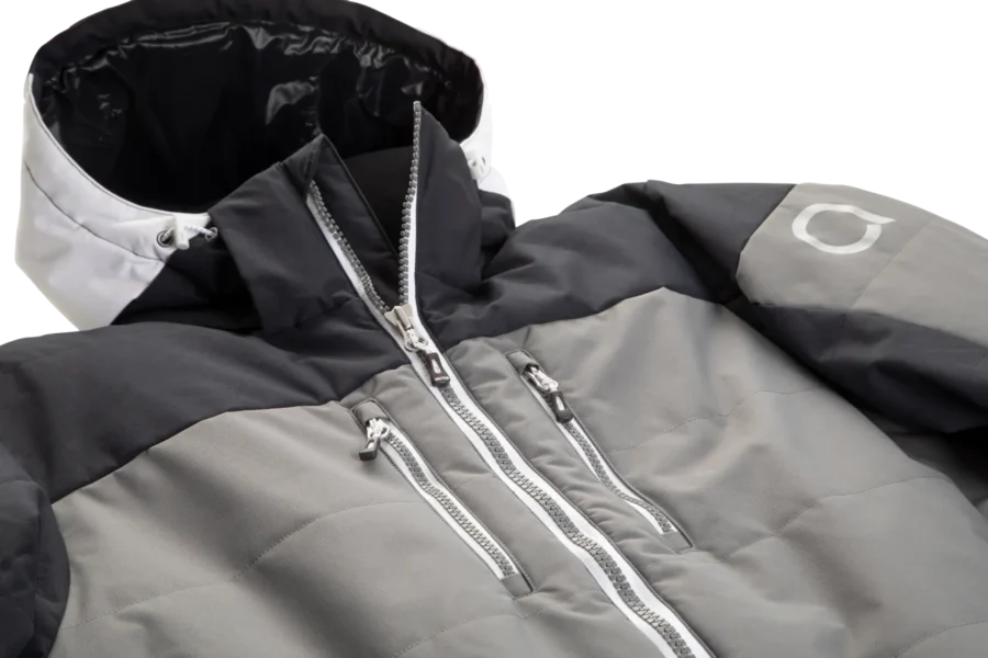 Close-up of the front zipper and two chest zip pockets on the Arctica Adult Sonic Ski Jacket in Black.