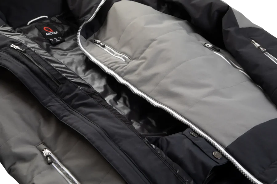 Interior view of the Arctica Adult Sonic Ski Jacket in Black showing the lining, inner zip pocket and powder skirt.