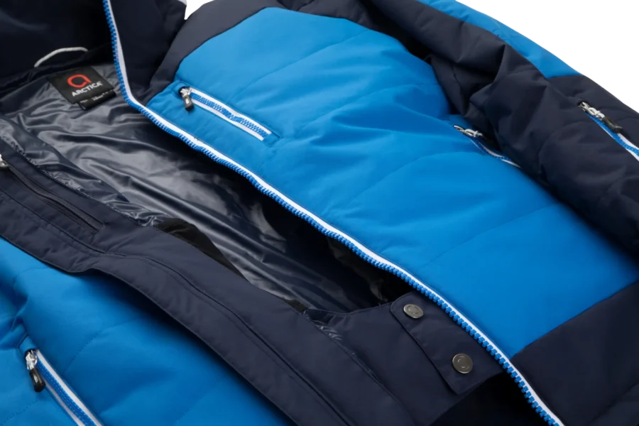 Interior view of the Arctica Adult Sonic Ski Jacket in Midnight showing the lining, inner zip pocket and powder skirt.