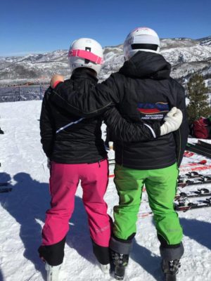 Husband and wife both wearing Arctica side zip ski pants.