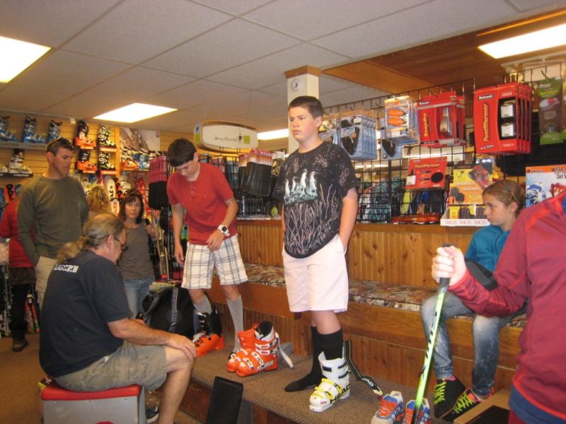 Boot fitting at Peak SKi Shop before summer ski camp.