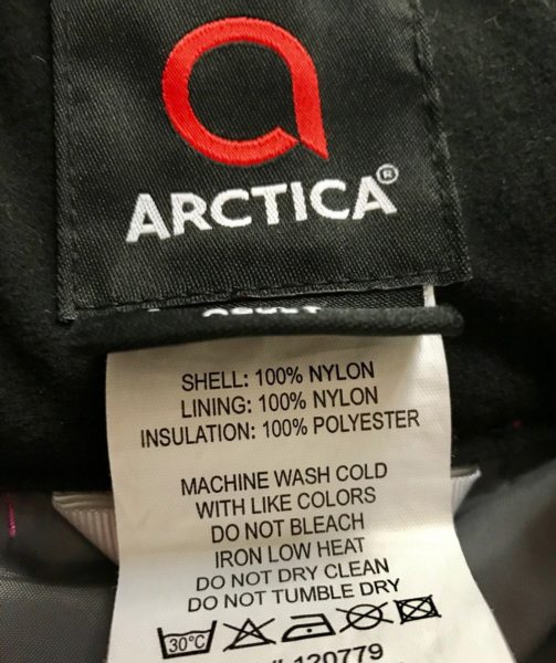Arctica fabric care label showing how to wash your ski gear.