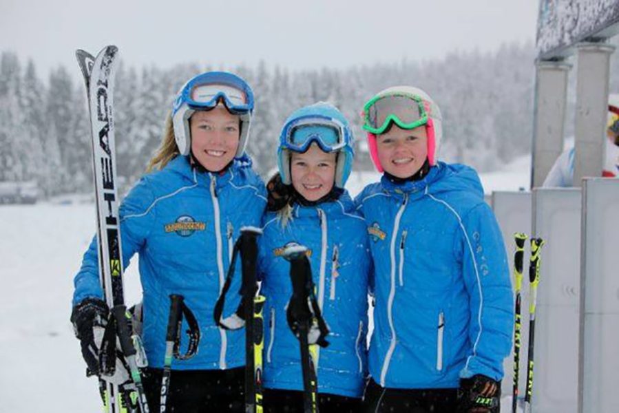 Three girls from the Täby Slalomklubb in Sweden after a day of training in their Arctica Speed Freak Team jackets. They also wear these jackets as an awards jacket on race day.